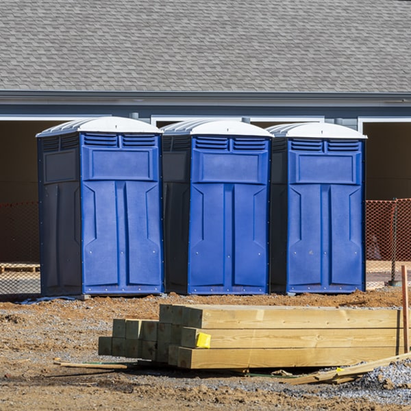 what is the cost difference between standard and deluxe porta potty rentals in Mediapolis IA